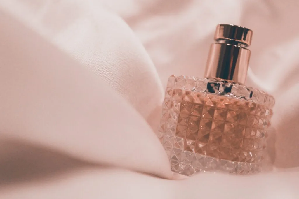 A perfume bottle with floral notes